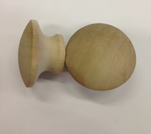 I just couldn't do the long dangle knobs on the current piece and these suckers were a whopping $.50 a piece.