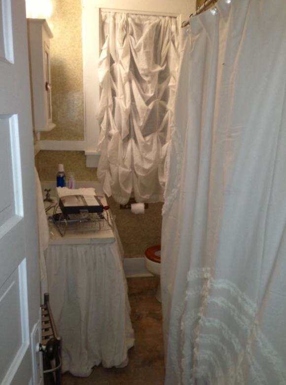 Yes. I do have the girliest bathroom of all times. I think it hides the poop brown overtones... Also - ignore the "stuff" everywhere. Did I mention I just moved?!