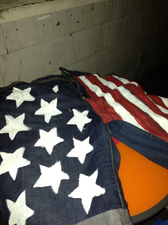 Started with star stencils and a pen and then just painted them in! The stripes were totally free handed!