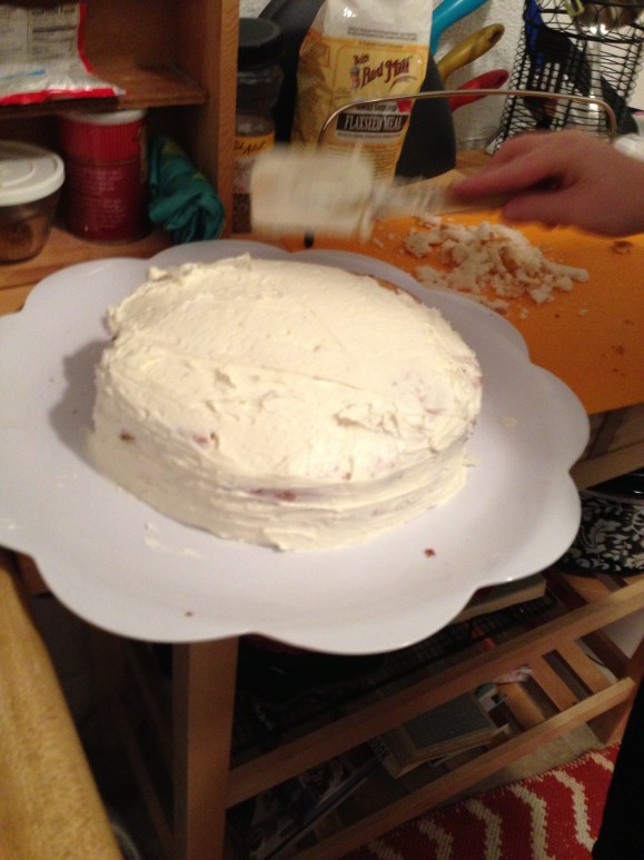 Bottom cake & top cake with a nice overlay of frosting!